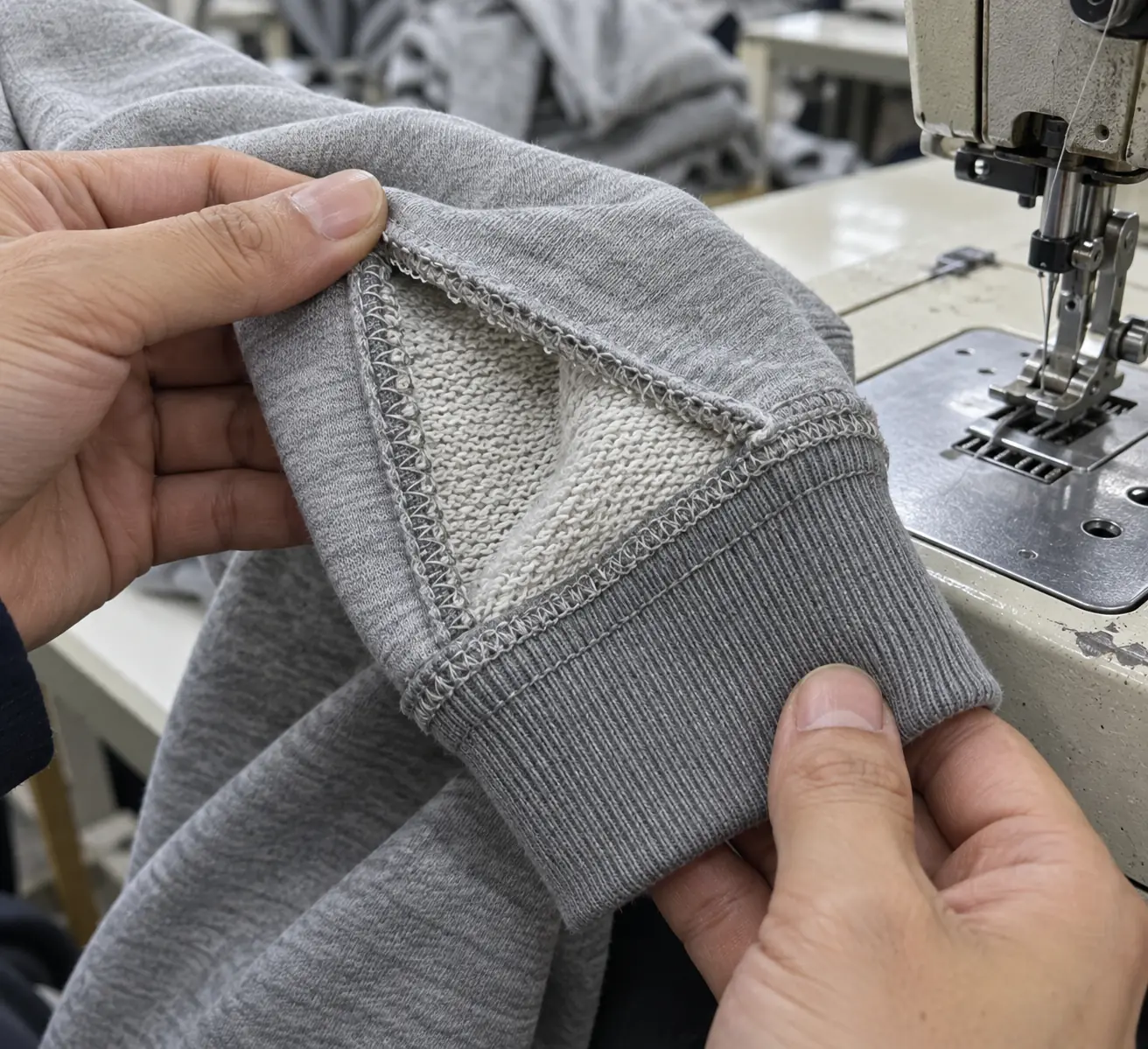 Hoodie seam sample showing the outer face, inner loops and attached rib