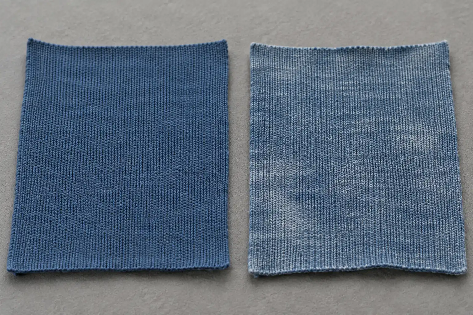 Close view of evenly colored cotton knit beside surface-colored washed cotton